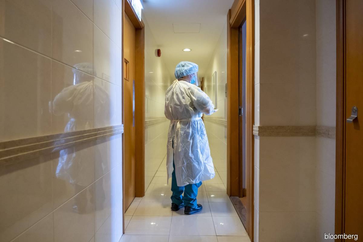 Hong Kong eases quarantine for vaccinated execs, drawing ire